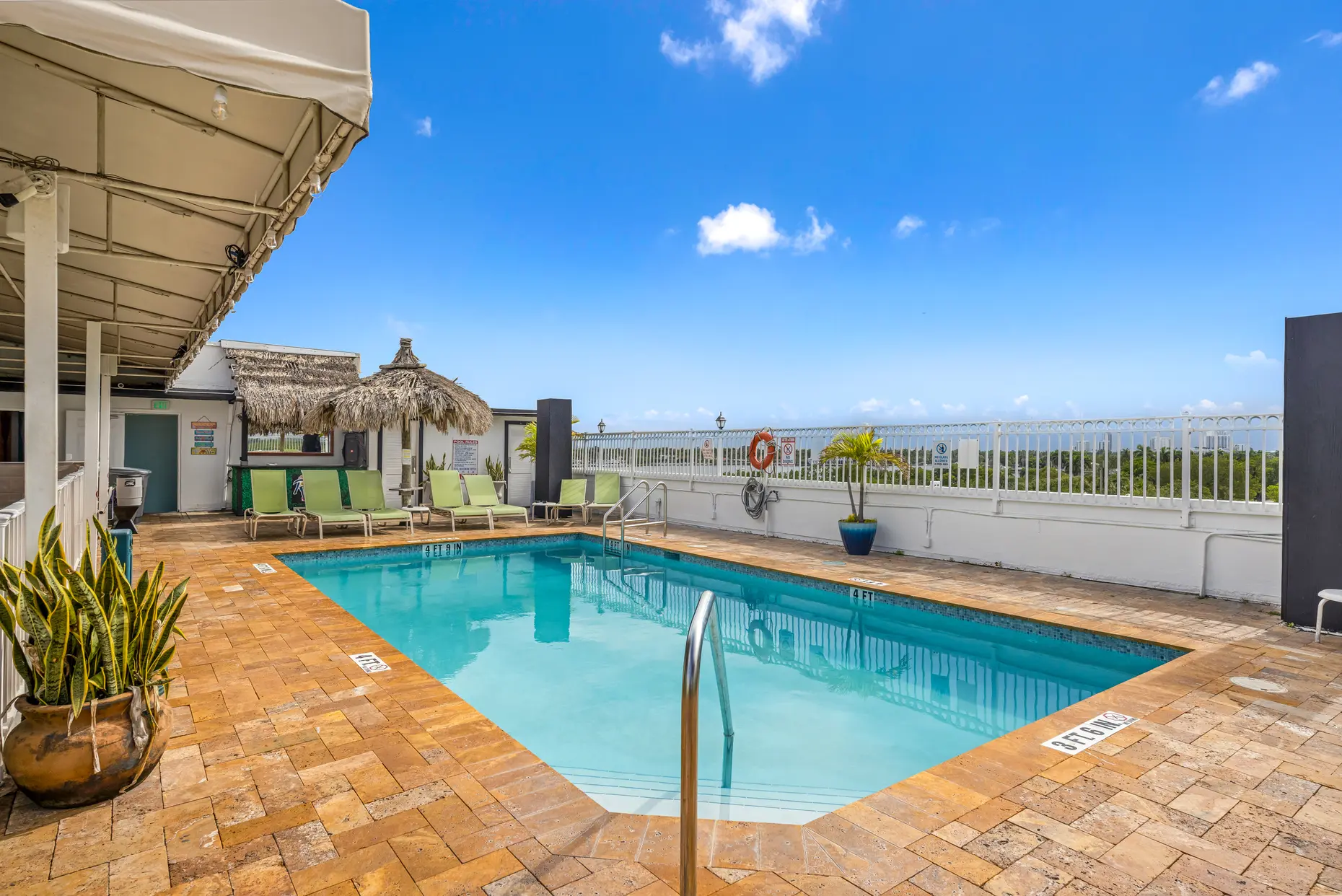 Rooftop pool and ocean-side railing